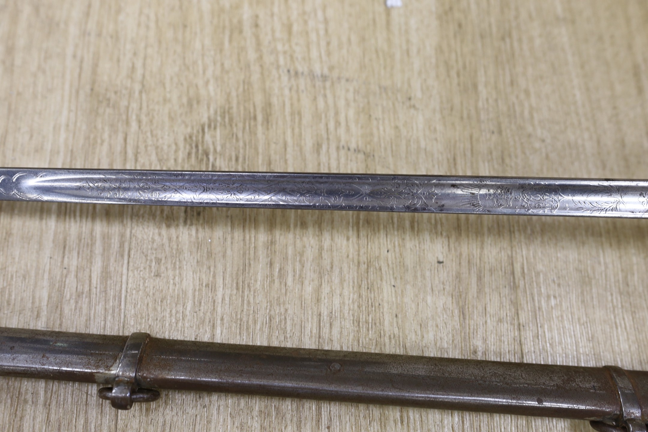 A George V officers sword with scabbard and a bayonet, sword100cm long